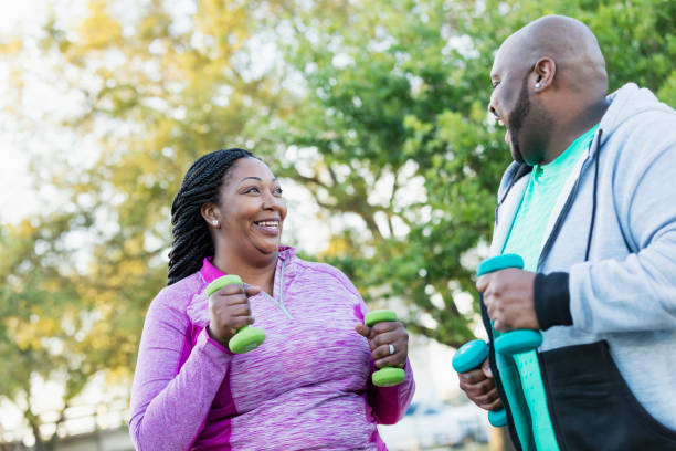 istock African-American couple exercising together 1047628830