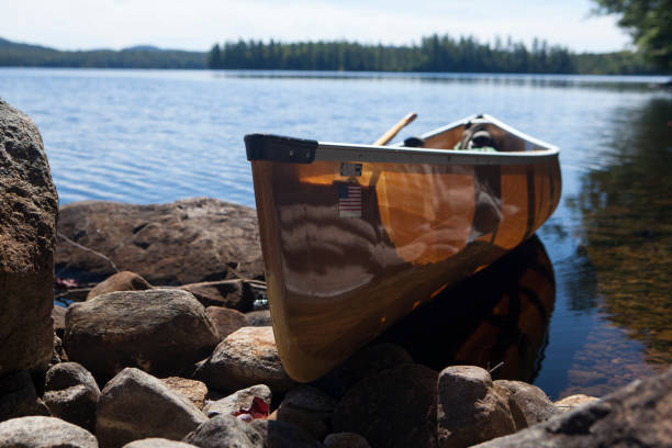 istock Canoe by the lake 1047631600