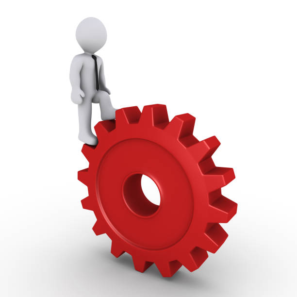 istock Businessman climbing on cogwheel 1047632418