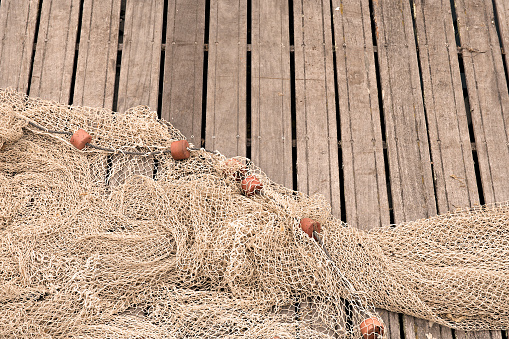 Fishing nets on pier. Copy space