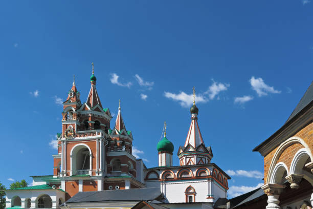 istock Belfry and Trinity gate church 1047632686