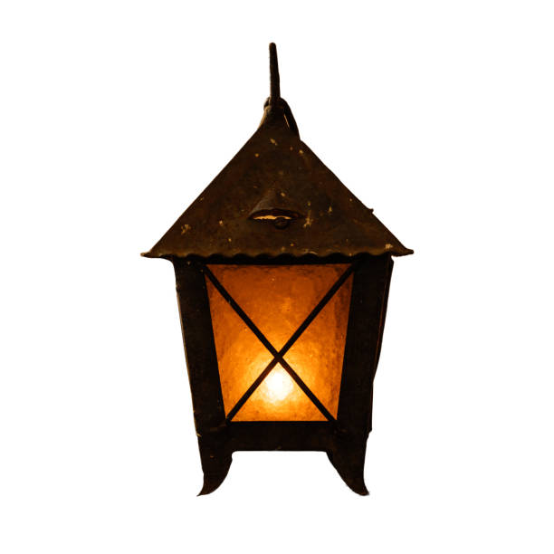 istock Burning old candle vintage rusty lantern on a white background. 1047635560