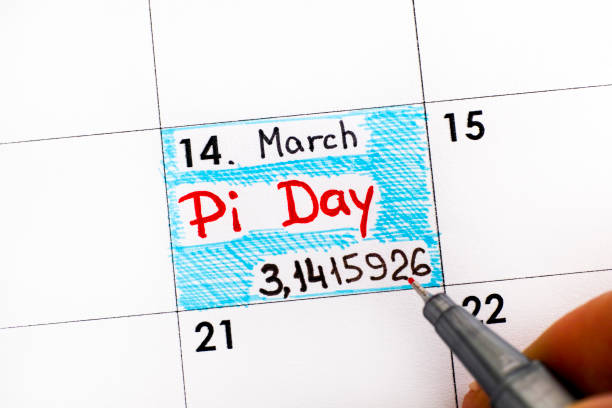 Woman fingers with pen writing reminder Pi Day in calendar. Woman fingers with pen writing reminder Pi Day in calendar. Pi Day is celebrated on March 14th (3/14) around the world. Pi stock pictures, royalty-free photos & images