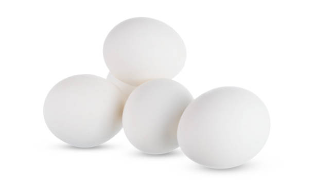 istock Group of whole white eggs isolated on white background 1047639314