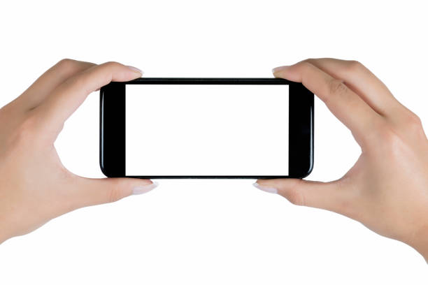 istock Hand holding mobile phone on white 1047639960