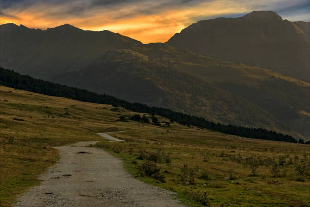 istock Sunset in the valley of aran de Lleida 1047647710