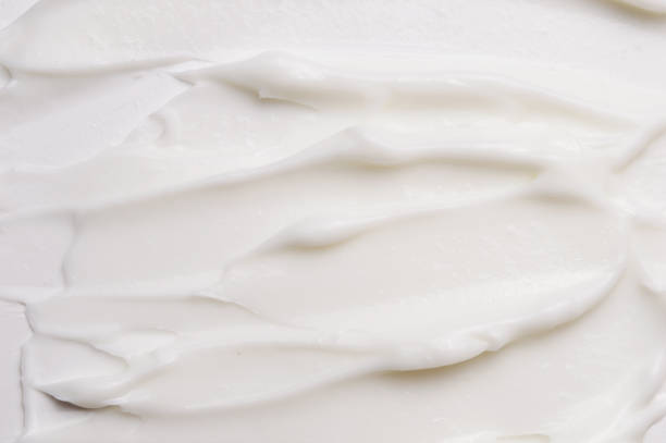 istock Cosmetic liquid cream for skin white background texture 1047648326