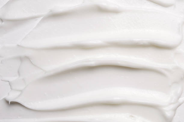 istock Cosmetic liquid cream for skin white background texture 1047648328