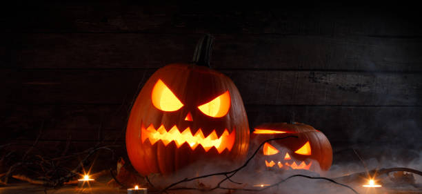 istock Halloween pumpkins in mist 1047648798