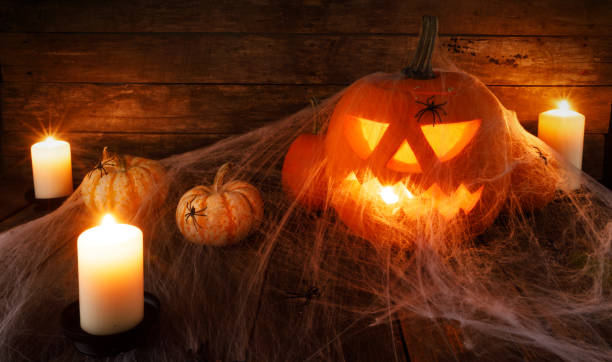 istock Halloween pumpkin and spiders 1047648902