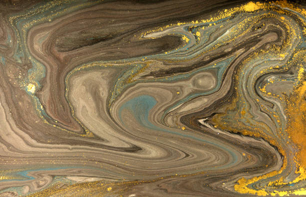 istock Gold marbling texture design. Blue and golden marble pattern. Fluid art. 1047653588