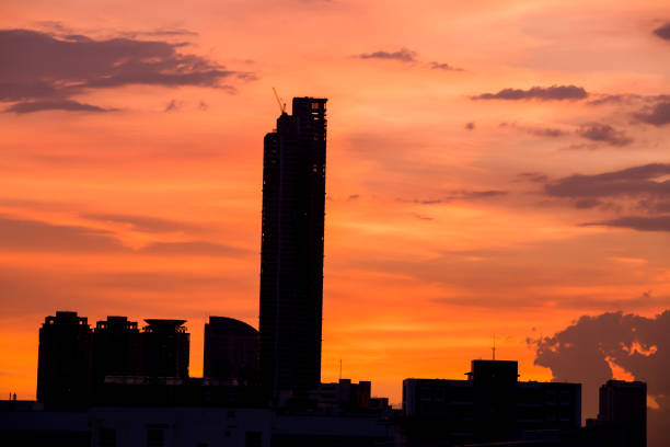 istock sky with clouds over the evening city 1047653622