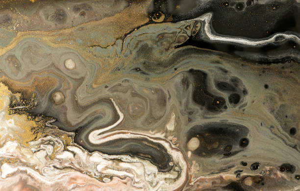 istock Gold marbling texture design. Golden marble pattern. Fluid art. 1047653644