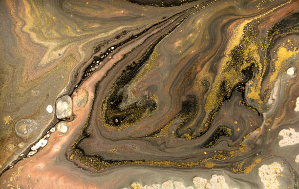 istock Gold marbling texture design. Golden marble pattern. Fluid art. 1047653700
