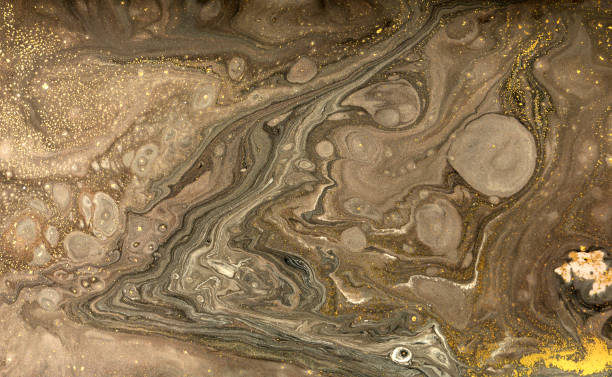 istock Gold marbling texture design. Beige and golden marble pattern. Fluid art. 1047653944