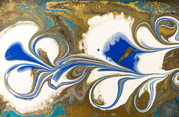 istock Gold marbling texture design. Blue and golden marble pattern. Fluid art. 1047654020