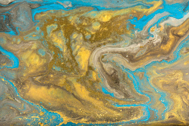 istock Gold marbling texture design. Blue and golden marble pattern. Fluid art. 1047654046