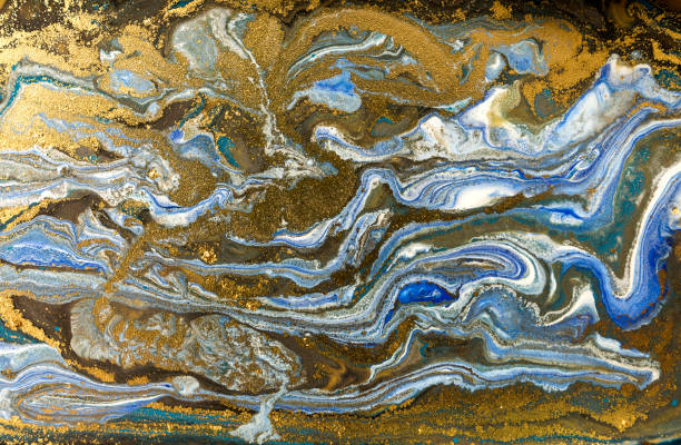 istock Gold marbling texture design. Blue and golden marble pattern. Fluid art. 1047654074