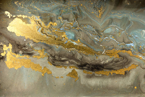istock Gold marbling texture design. Blue and golden marble pattern. Fluid art. 1047654256