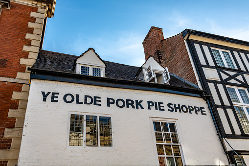 Melton Mowbray, UK. 29 September 2018. The exterior of the famous and historic 1851 'Ye Olde Pork Pie Shoppe' pie shop on the high street of Melton Mowbray in Leicestershire.