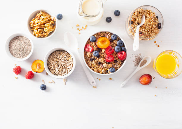 istock healthy granola for breakfast with berry fruit nut, vegan milk 1047657616