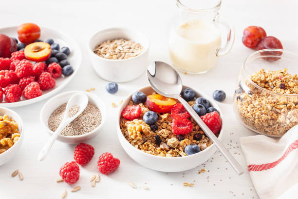 istock healthy granola for breakfast with berry fruit nut, vegan milk 1047657880