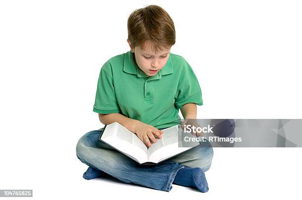 Boy Reading Crossed Legs Stock Photo - Download Image Now - Cross-legged, Elementary School, Book