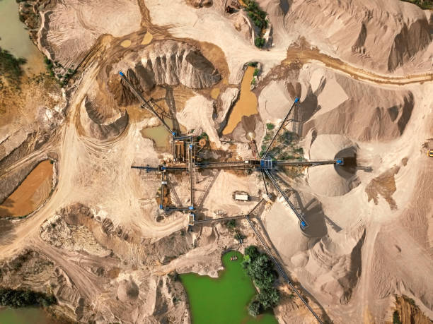 istock Aerial view of crushed stone quarry machine 1047658676