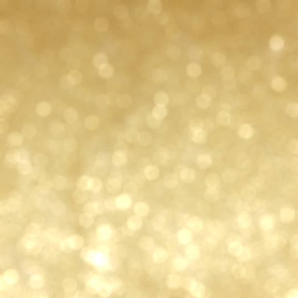 istock Beautiful gold background with sparkling glitter and bokeh light 1047665158