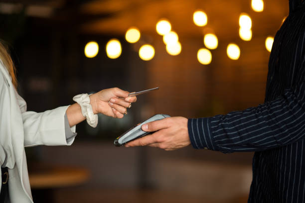 istock Tap contactless payment by credit or debit card 1047669294