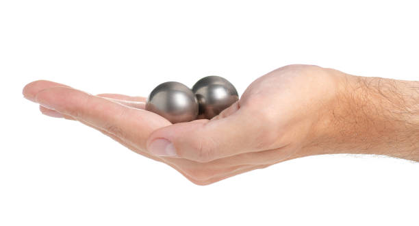 istock Metal ball in hand 1047672364