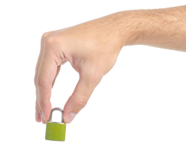 istock Small padlock metal in hand 1047672572