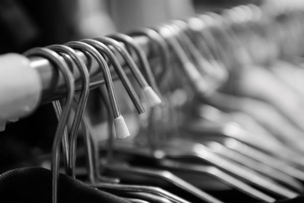 istock Clothes hangers in black and white 1047681208