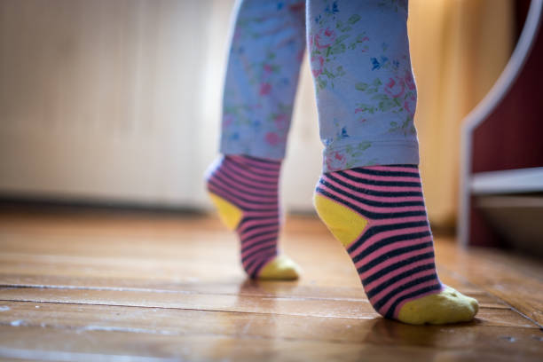 Little Girl's Legs Standing Tippy Toe Hardwood, Wood - Material, Human Foot, Human Leg tiptoe stock pictures, royalty-free photos & images