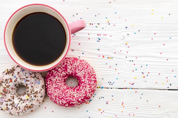 istock Donuts and a cup of coffee close-up 1047684854