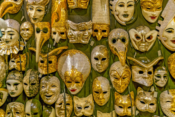 Group of traditional venetian masks at window store