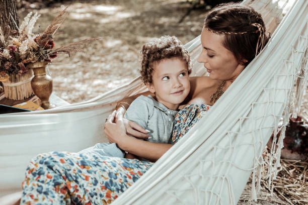 istock Pleasant mother telling something to her child 1047690564