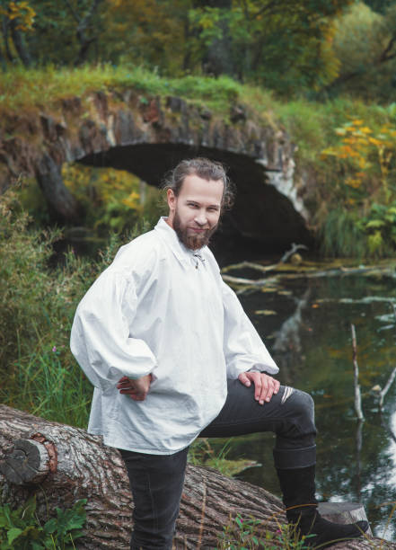 istock Handsome man in medieval costume standing 1047693270
