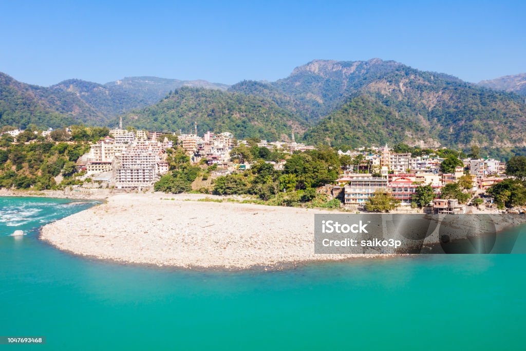 Rishikesh in India Rishikesh panoramic view, India. It is known as the Gateway to the Garhwal Himalayas and the Yoga Capital of the World. Ancient Stock Photo