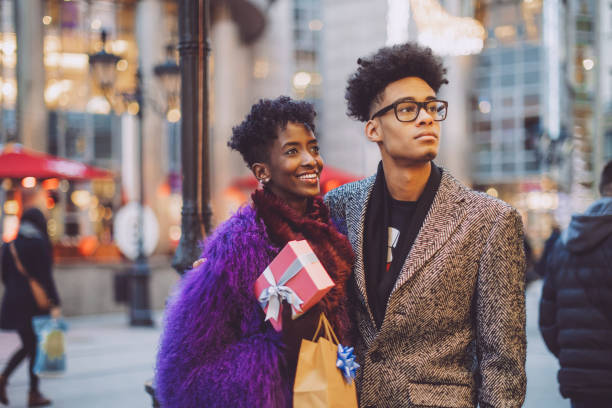 istock Young couple is buying Christmas presents 1047694434