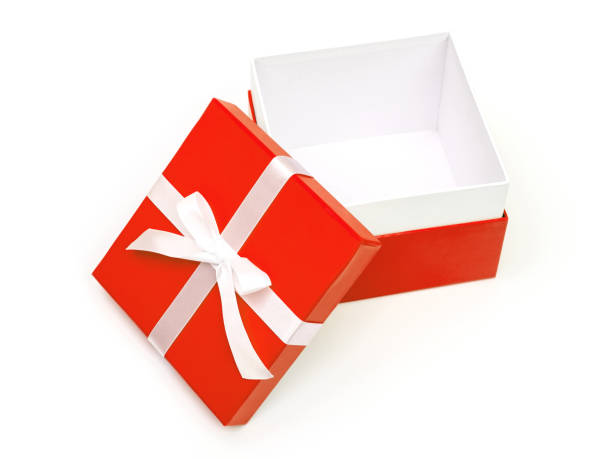 istock Red gift box with ribbon bow. Holiday present. Isolated on white background 1047699908
