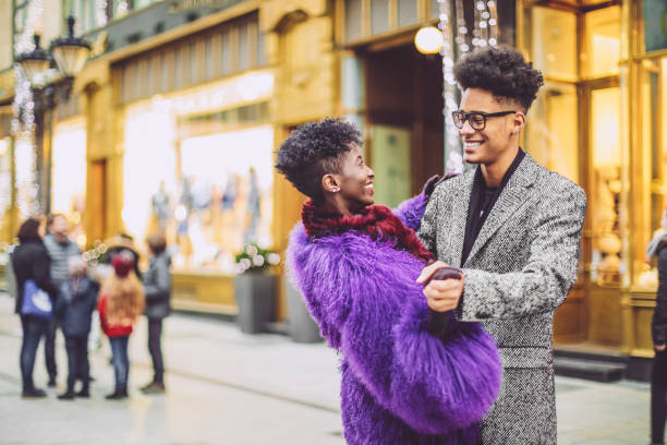 istock Young couple is buying Christmas presents 1047700148
