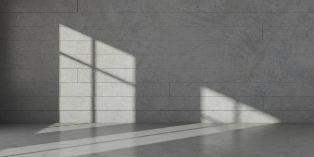istock Abstract of minimal architecture space with the sun light cast shadow on the  wall, 3D rendering. 1047700154