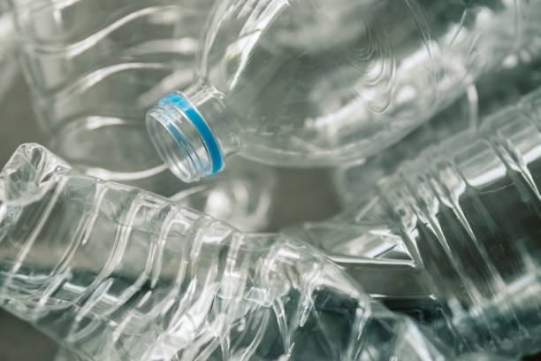 istock Used plastic bottles in recycle bin 1047704450