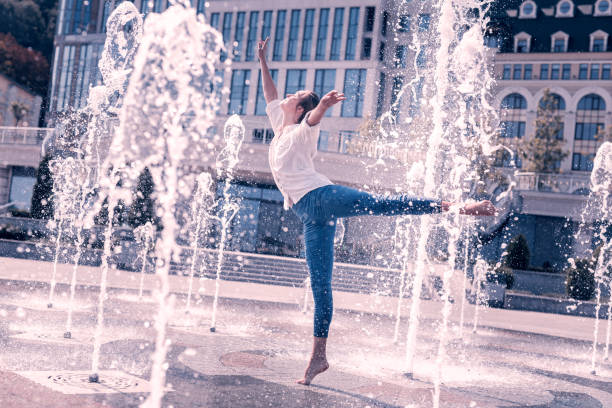 istock Beautiful professional ballerina dancing with bare feet 1047713030