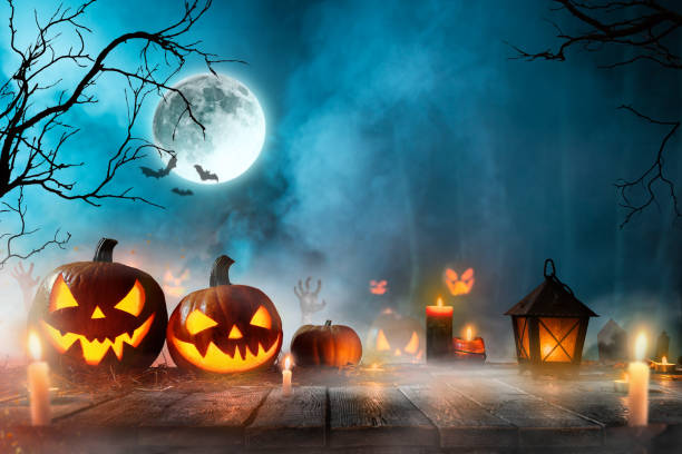 istock Halloween pumpkins on old wooden planks. 1047714620