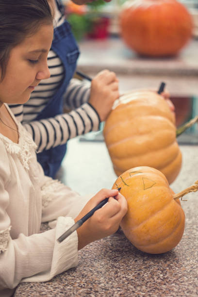 istock Family Preparing for Halloween 1047715328