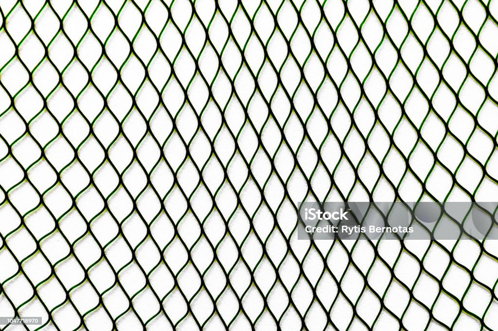 Black net placed vertically on the white soft background surface Abstract Stock Photo
