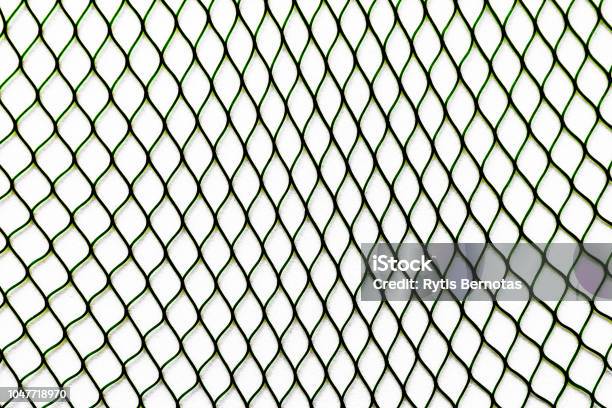 Black Net Placed Vertically On The White Soft Background Surface Stock Photo - Download Image Now