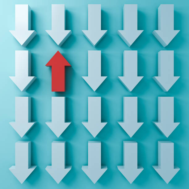 istock Stand out from the crowd and Think different concepts One red up arrow  among other white down arrows on blue green pastel color background with shadows 3D rendering 1047719616